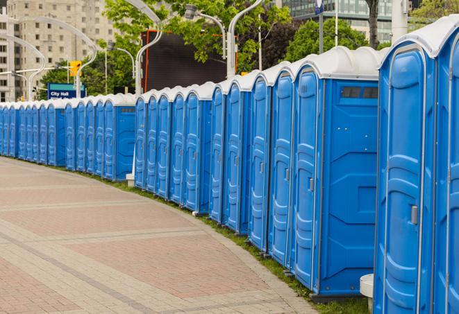 a row of portable restrooms set up for a special event, providing guests with a comfortable and sanitary option in Hammond, IN